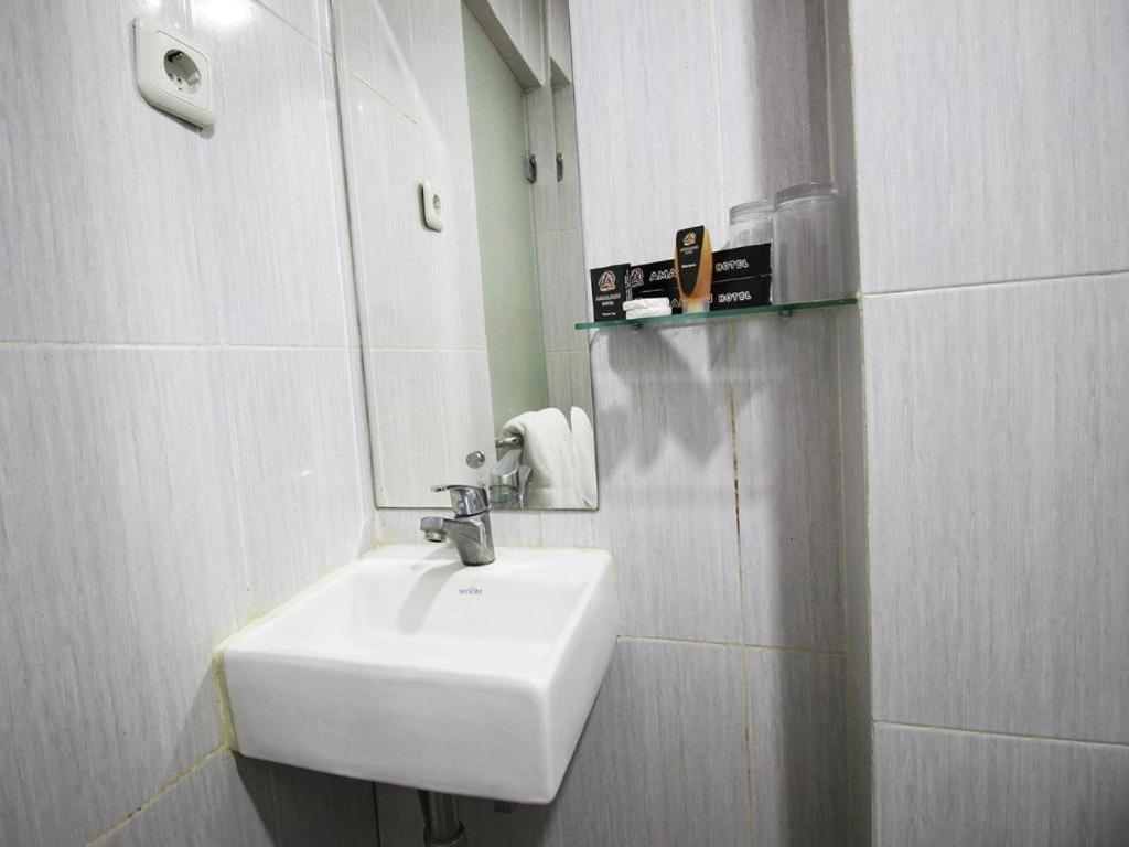 Amaliun Hotel Medan Esterno foto
