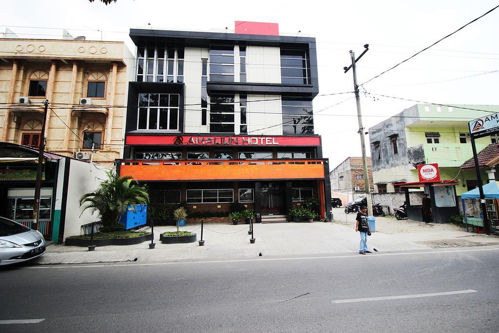 Amaliun Hotel Medan Esterno foto