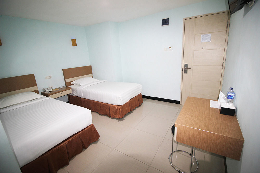 Amaliun Hotel Medan Esterno foto